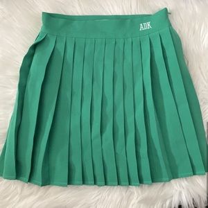 Adika Kelly green mini pleated tennis skirt